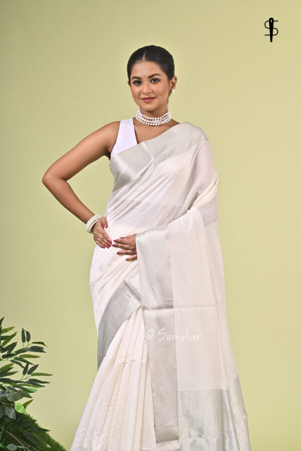 Minima II - Pure Cotton Saree with Silk Border in Twill Weave 1 Minima II handwoven pure cotton saree in white and muted silver with silk border