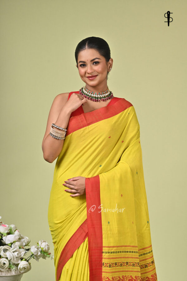 Roudrika handwoven pure cotton Bishnupuri saree in bright yellow with red and black Naksha