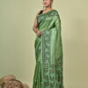 Bonolota green Tussar Jamdani saree with charcoal geometric motifs